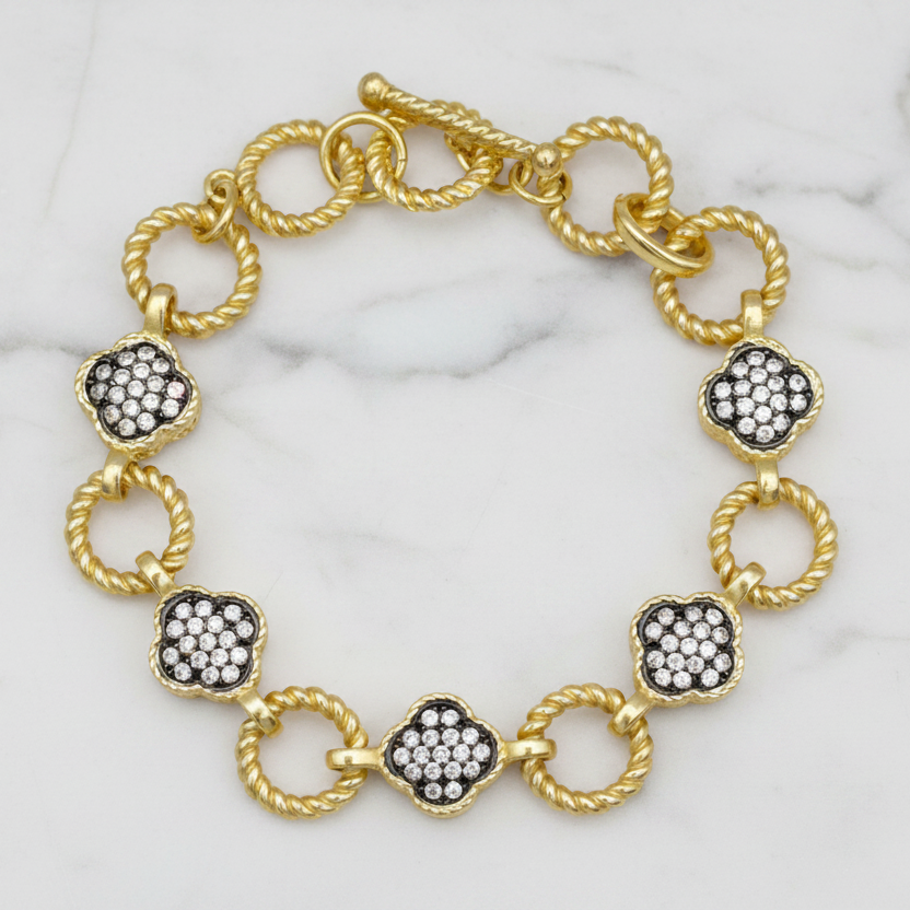 MX Clover Link Hematite CZ Bracelet featuring a silver-tone chain and cubic zirconia accents.