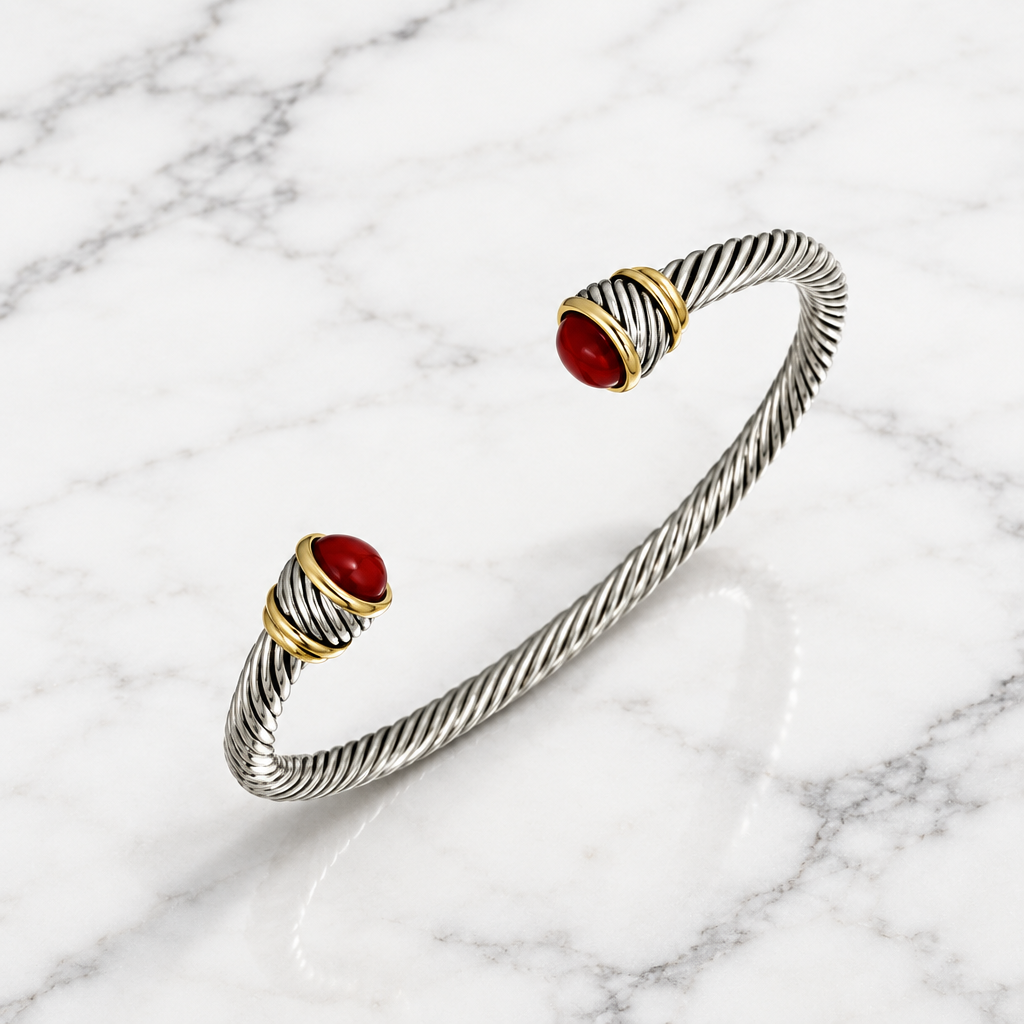 Two-tone open cable bracelet by Bobk featuring sleek, modern design with intertwined metal strands.