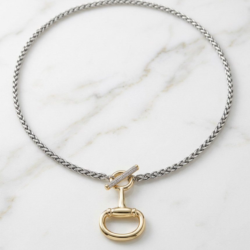 Two-tone horse bit pave bar necklace by MX featuring a stylish horse bit pendant and sparkling pave details.