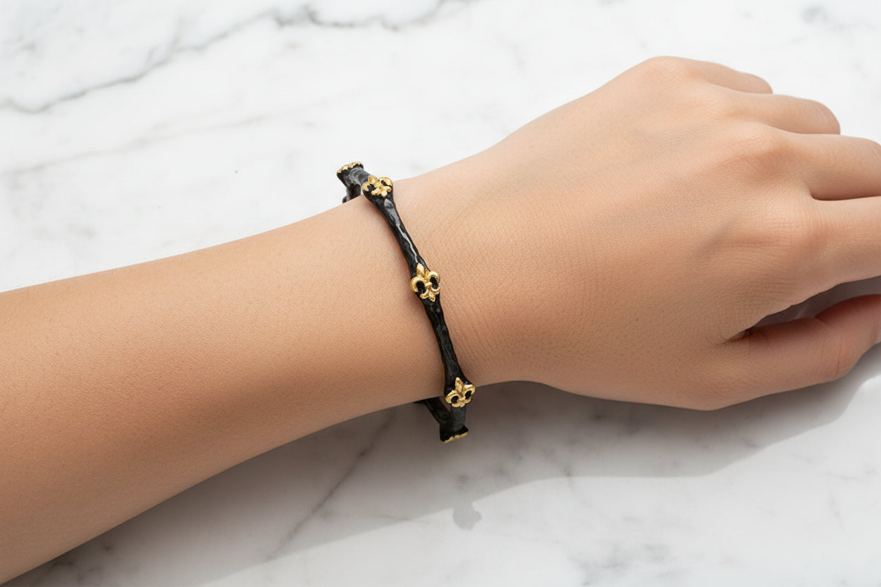 Thin Hematite Bangle w/ Gold Fleur De Lis