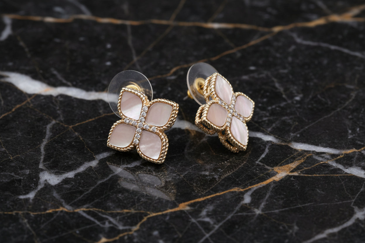Lorena gold MOP cable and CZ earrings, stylish dangle earrings featuring mother-of-pearl and cubic zirconia accents.