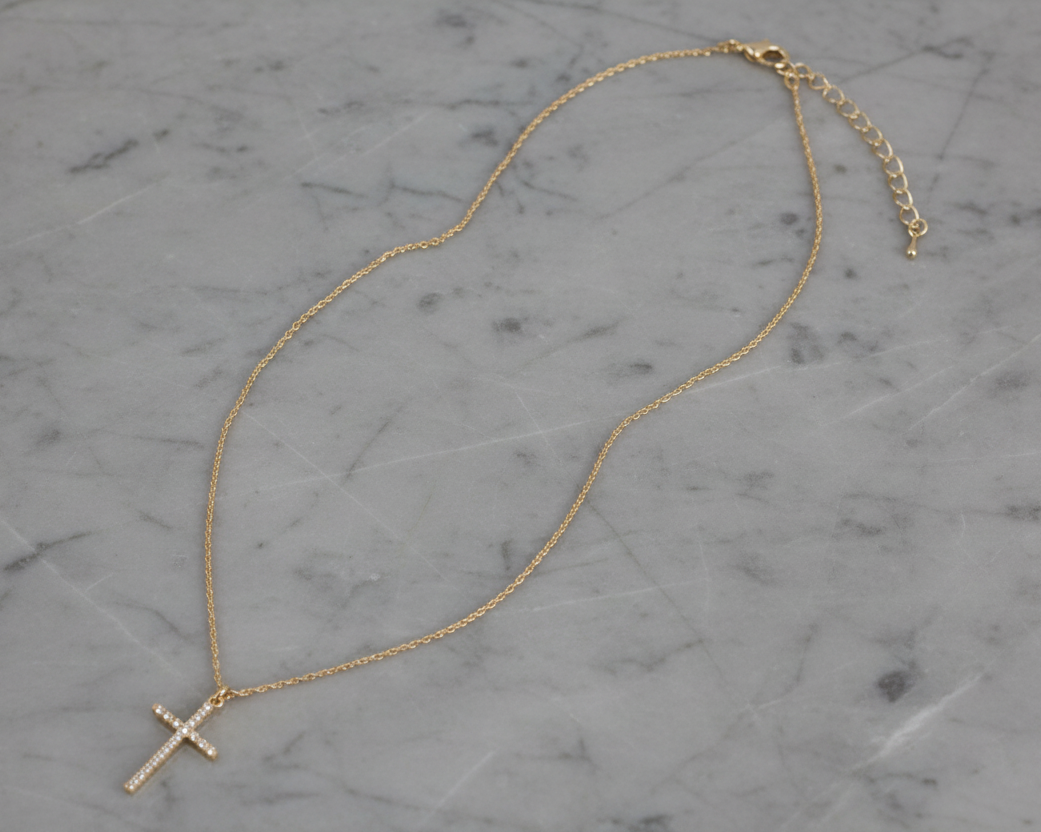 Lorena CZ cross necklace in 16-inch length featuring a sparkling silver-tone pendant on a chain.
