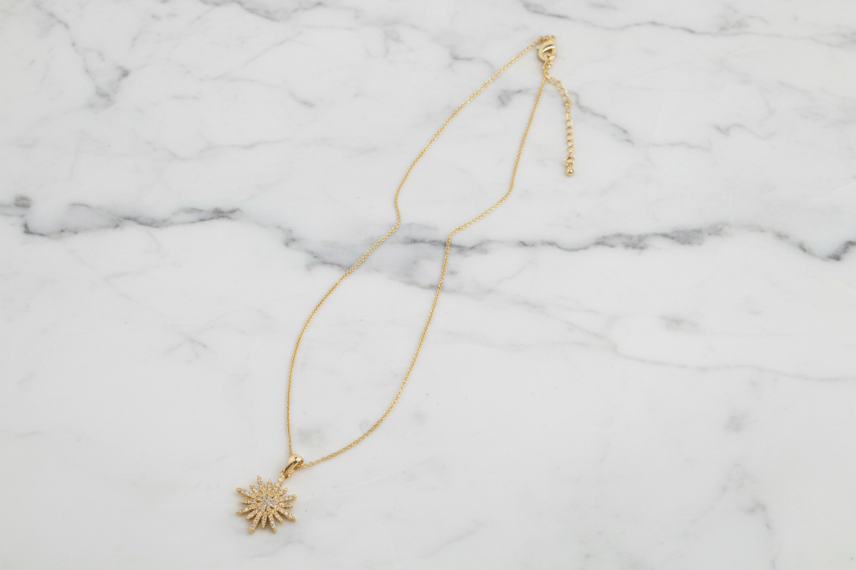 Lorena pave round star necklace with a 16-inch chain, featuring a sparkling star pendant on a delicate chain.