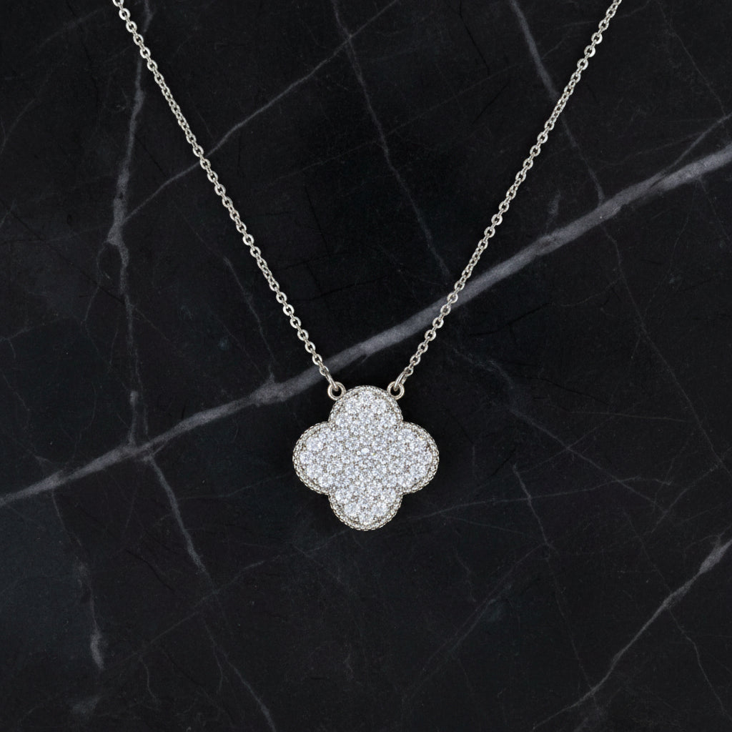 Marcony pave clover necklace with 16+2 inch chain, featuring sparkling clover pendant and silver-tone finish.