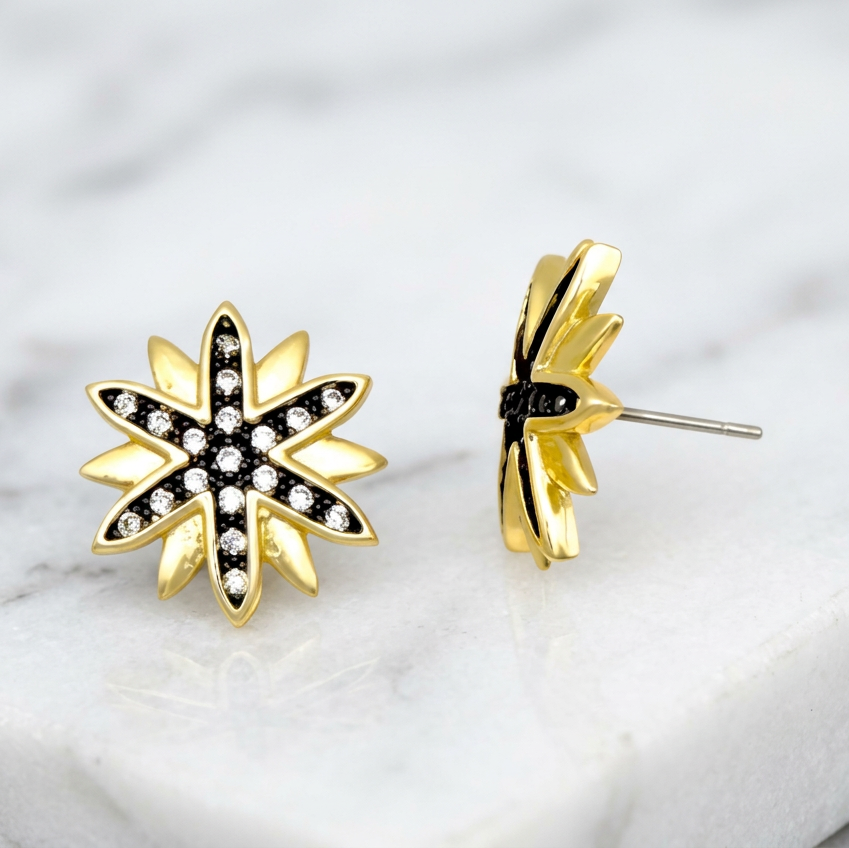 Matte gold hematite cosmic post earring by MX featuring a celestial design on a sleek metal post.