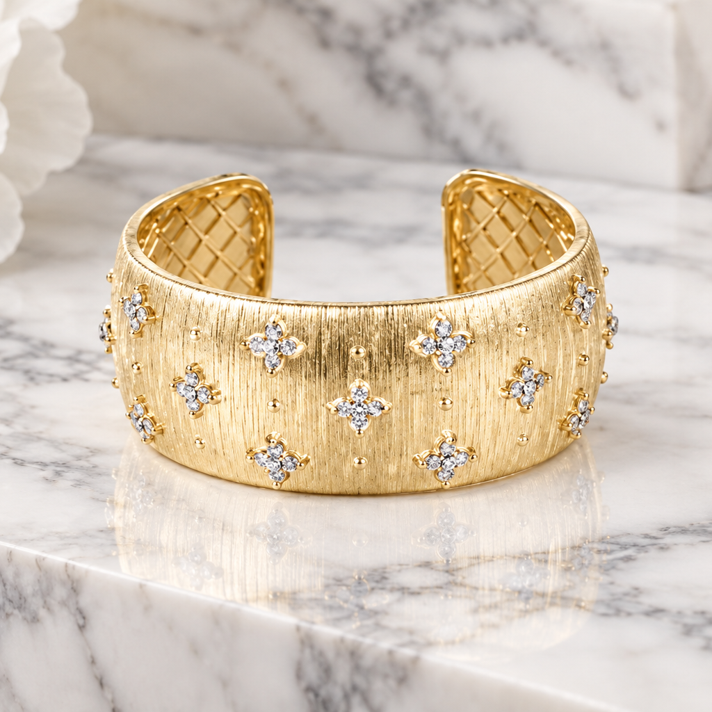 Matte CZ flower cuff bracelet by Joseph Anthony Inc. featuring a floral design with cubic zirconia accents and a sleek metal finish.