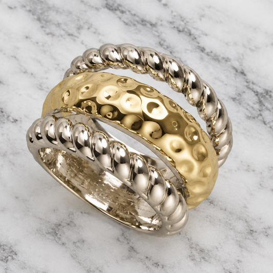 Intertwined gold and silver 3-band cable ring by MX, showcasing a stylish two-tone design with smooth, polished finishes.