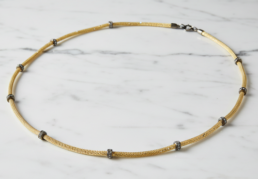 Silver mesh necklace with cubic zirconia stations, 36 inches long, by Joseph Anthony Inc.