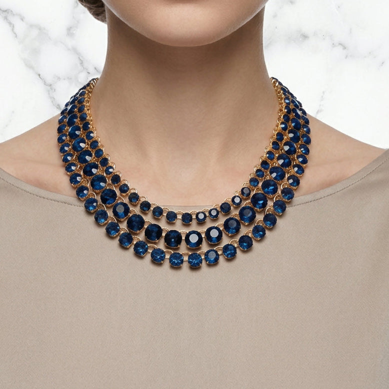 Rough Sketch Ooh & Aah triple strand necklace with layered chain design in dark blue and gold tones