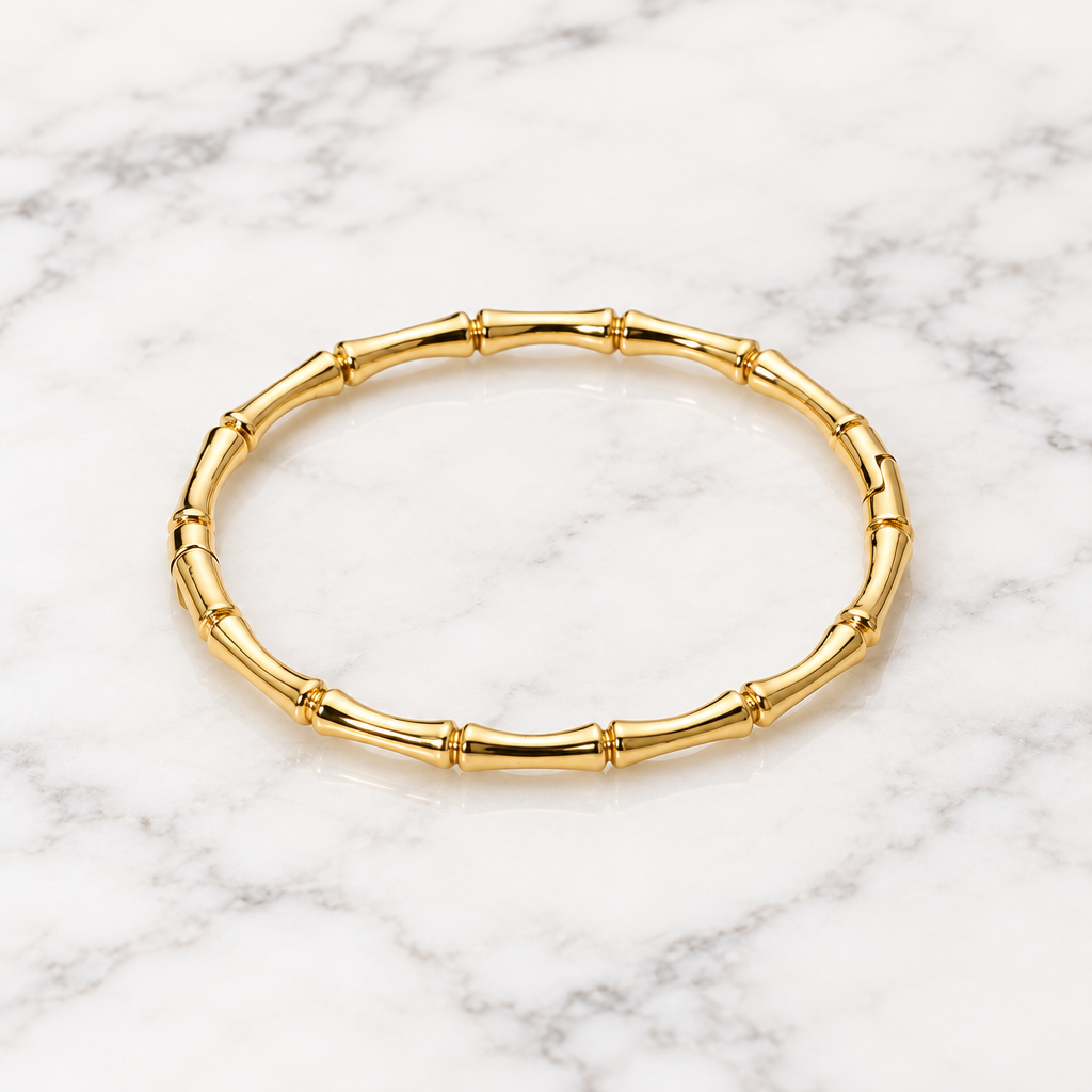 Close-up of MILAA bamboo enamel bangle bracelet showcasing its smooth bamboo and colorful enamel design.