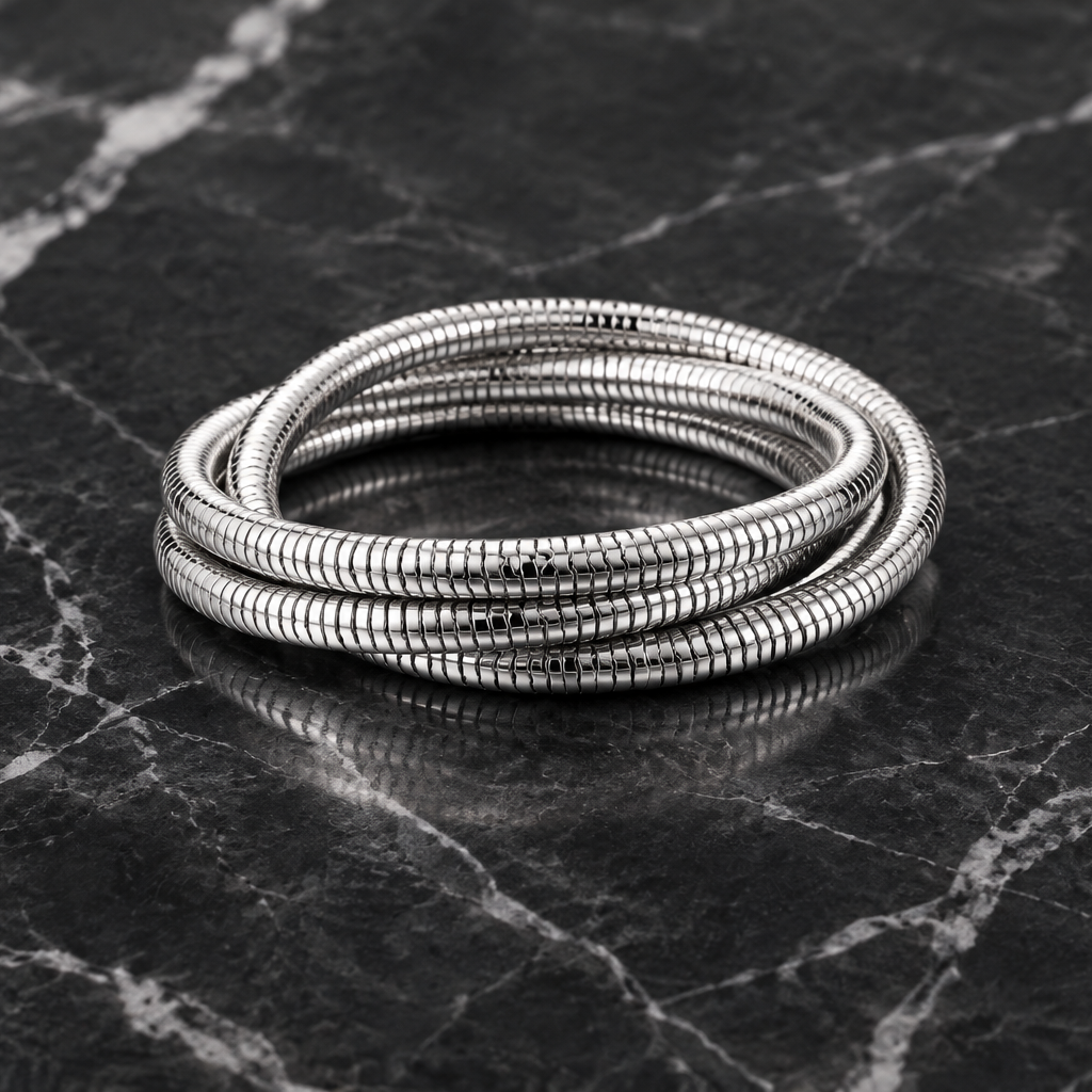 Gold 3-row stretch bracelet by MX with sleek, intertwined design showcasing elegant jewelry style.