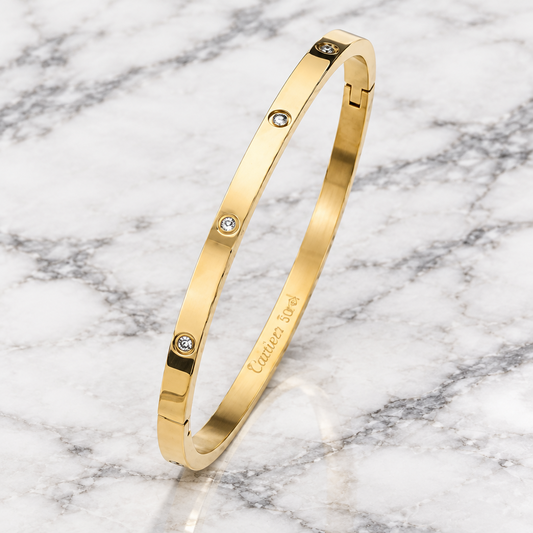 Silver 5 CZ bangle bracelet by MILAA featuring sparkling cubic zirconia stones and a sleek, polished design.