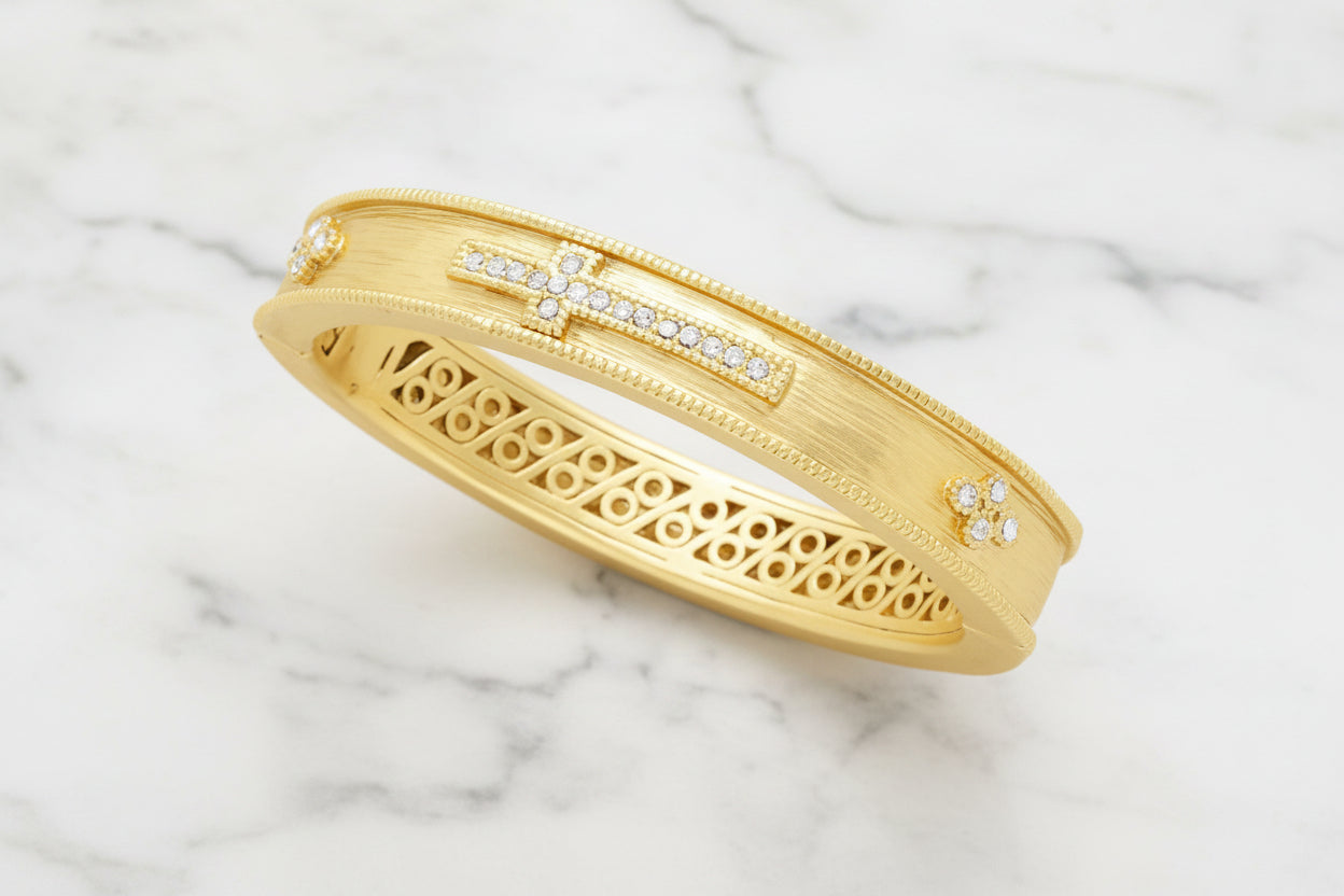 Lorena brushed gold bracelet with CZ cross pendant, elegant jewelry piece featuring sparkling cubic zirconia accents.