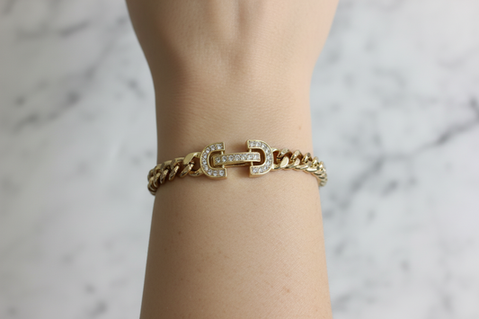 Lorena gold chain bracelet with CZ clasp, featuring a delicate and shiny design, perfect for stylish wrist jewelry.