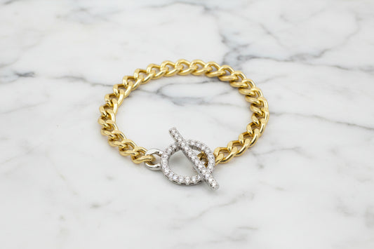 Lorena gold chain bracelet with CZ toggle clasp, featuring a delicate design and sparkling cubic zirconia accents.