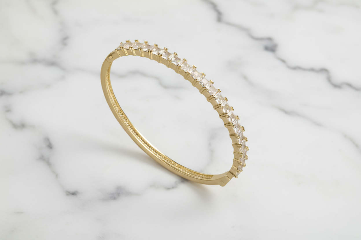 Lorena bracelet featuring a sleek bangle design with sparkling cubic zirconia stones for an elegant look.