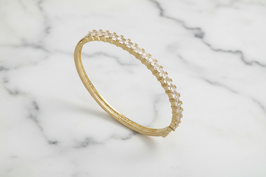 Lorena bracelet featuring a sleek bangle design with sparkling cubic zirconia stones for an elegant look.