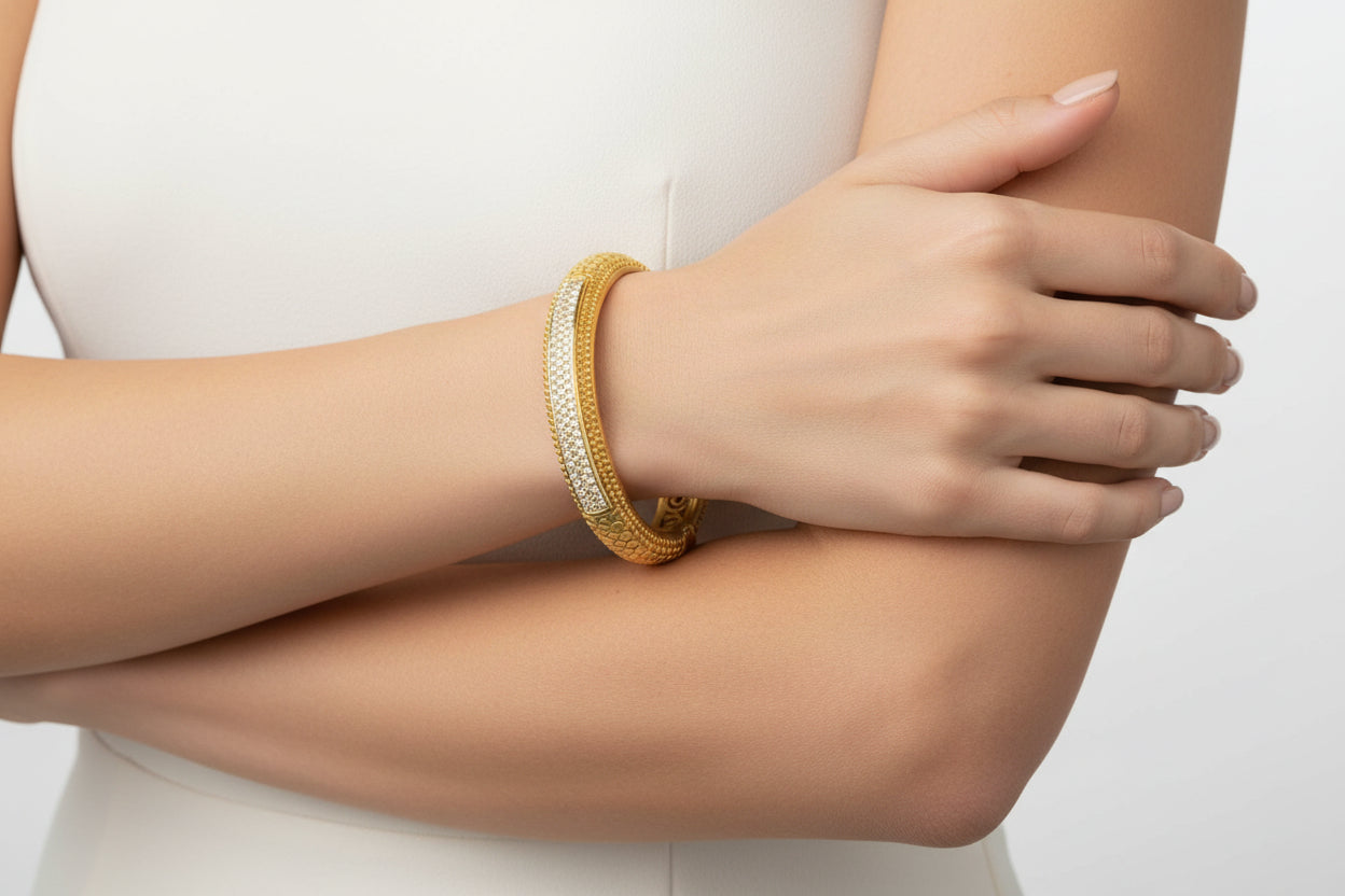 Lorena Dots and Pave Bangle bracelet with sparkling stones and gold-tone finish, stylish jewelry accessory.