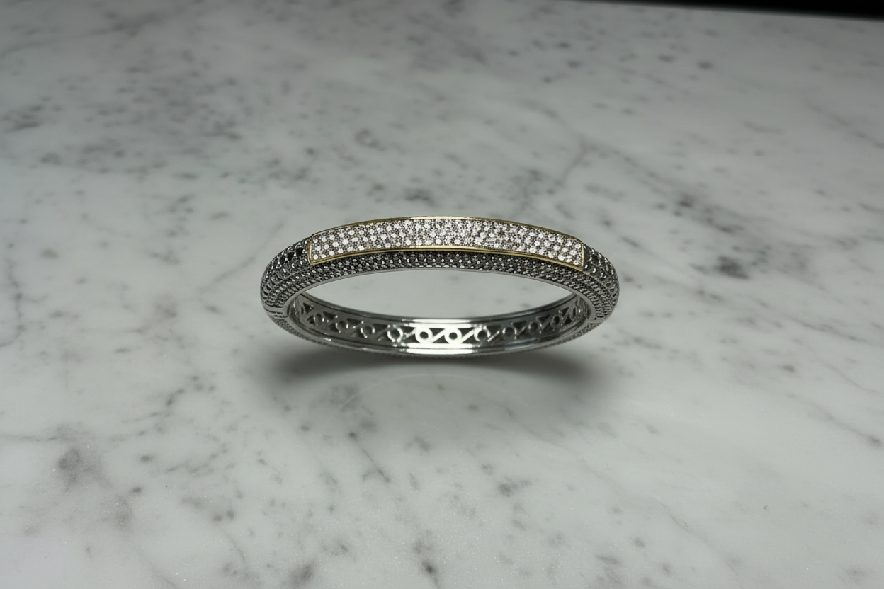 Lorena Dots and Pave Bangle bracelet with sparkling stones and gold-tone finish, showcasing intricate design and elegant style.