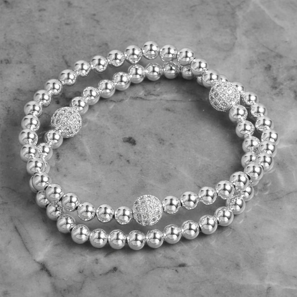 Lorena double layer CZ ball bracelet featuring sparkling cubic zirconia stones and a sleek silver-tone design.