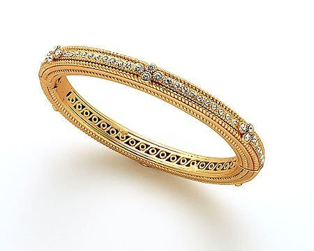Lorena Ornate Pave CZ Bangle bracelet with sparkling cubic zirconia, intricate gold detailing, and elegant design.