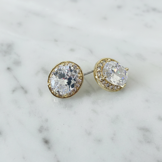 Lorena Brilliant Oval CZ and Gold Earring with a polished gold finish and sparkling oval cubic zirconia centerpiece.