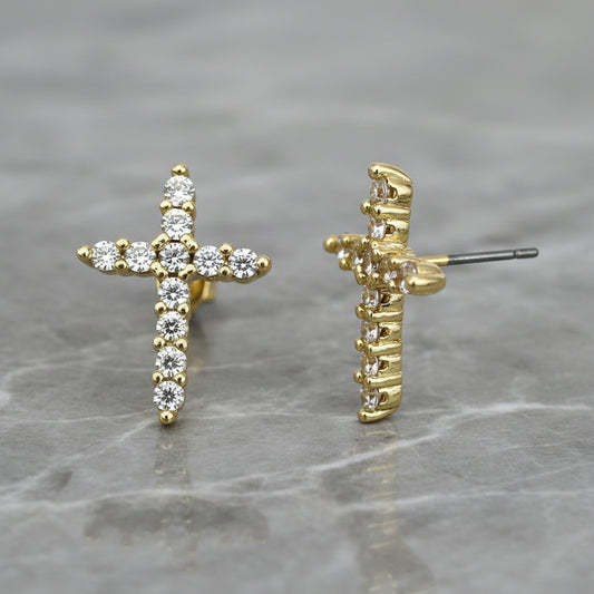 Lorena cross-shaped CZ post earring featuring a silver-tone metal design with sparkling cubic zirconia accents.