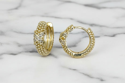 Lorena gold bead huggie earring with pave X design, featuring small gold beads and sparkling pavé accents.