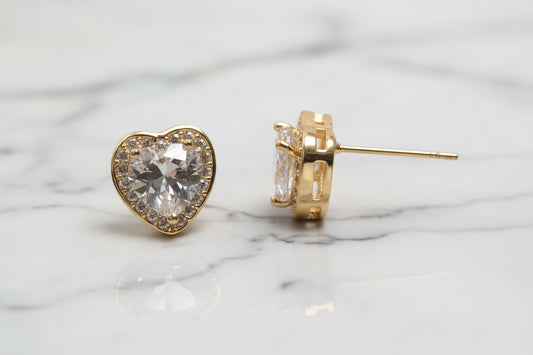 Lorena gold CZ heart stud earring with sparkling cubic zirconia, showcasing a delicate and elegant jewelry design.
