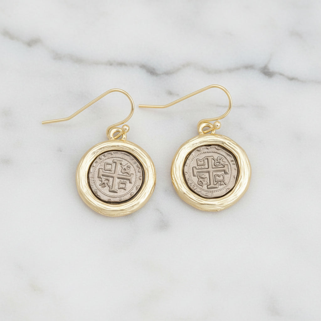 Lorena gold dangle earring with hem coin design, featuring intricate detailing and a sleek, elegant style.