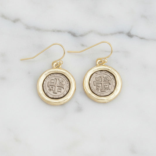 Lorena gold dangle earring with hem coin design, featuring intricate detailing and a sleek, elegant style.
