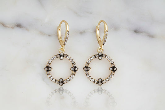 Lorena gold hematite dangle round earring with polished hematite stone and gold-tone metal, stylish and elegant jewelry accessory.
