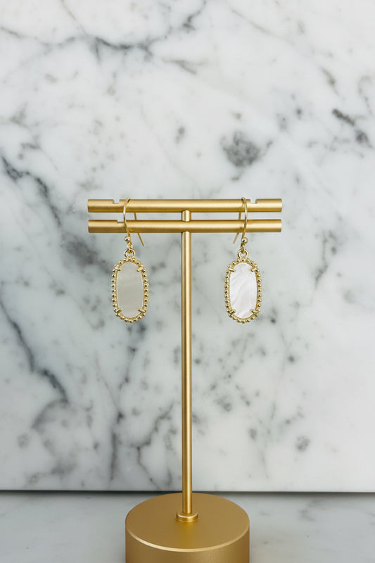 Lorena gold and mother of pearl rectangle dangle earring with elegant design and polished finish, showcasing a stylish jewelry accessory.