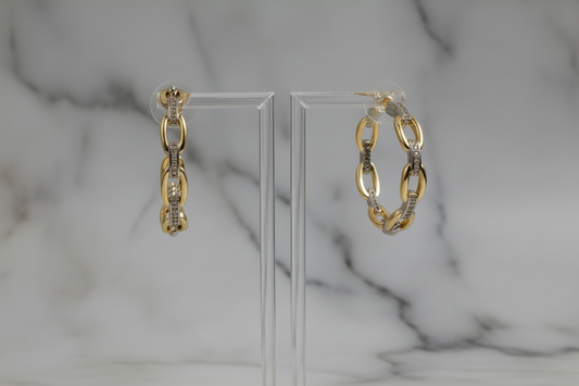 Lorena two-tone chain link hoop earring with bold, interconnected design, made of mixed metal tones for a stylish look.