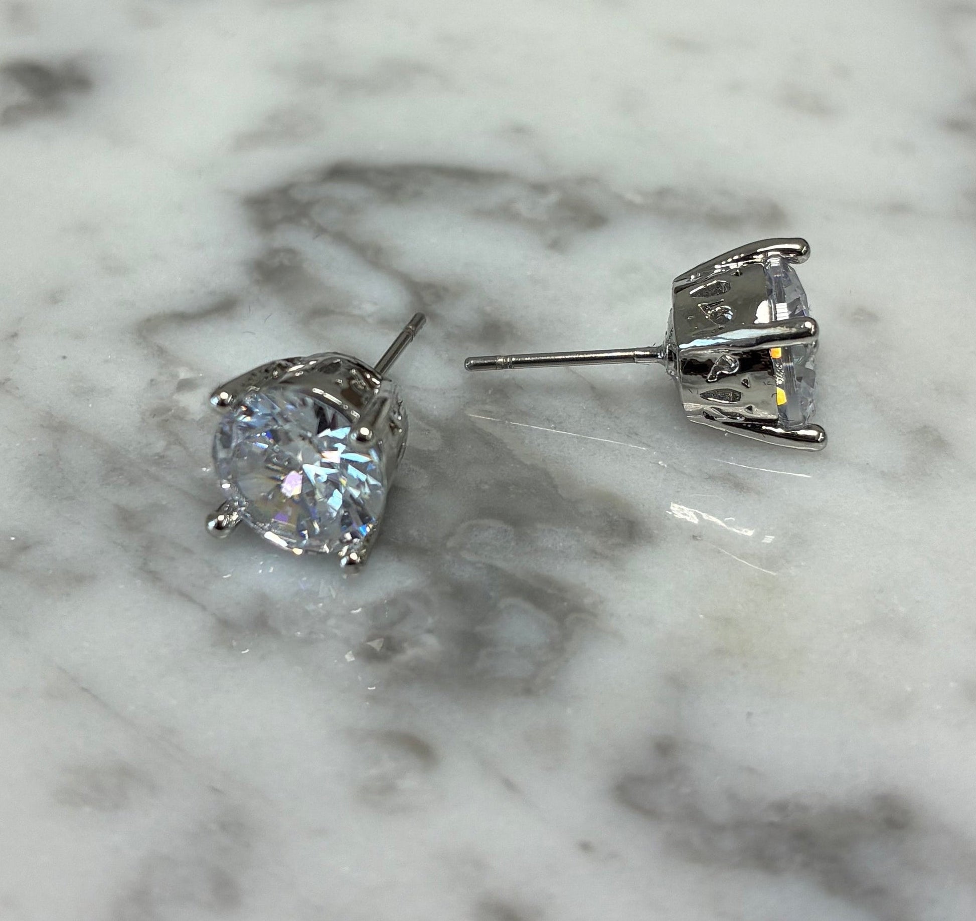 Lorena 8mm CZ stud earring featuring sparkling cubic zirconia set in a silver-toned metal.