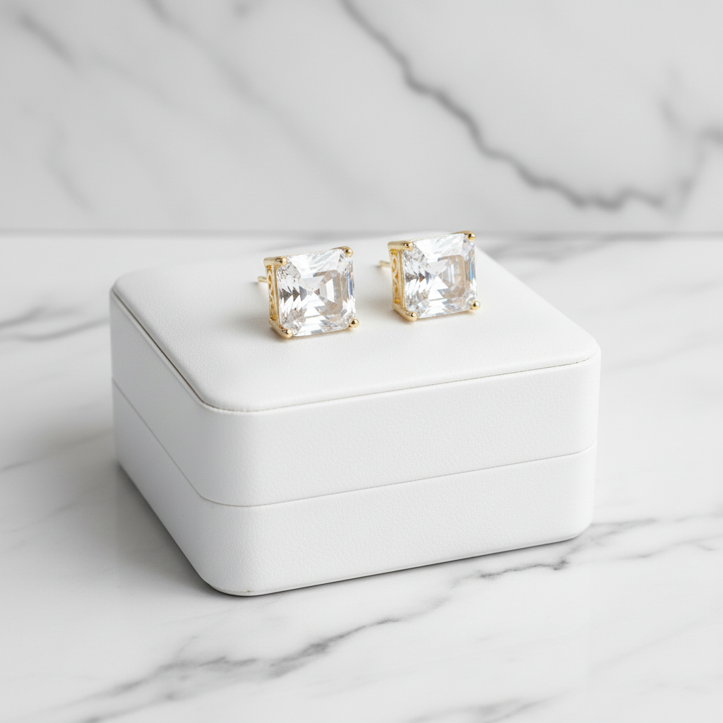 Lorena gold CZ square stud earring with sparkling cubic zirconia, showcasing a sleek and stylish jewelry design.