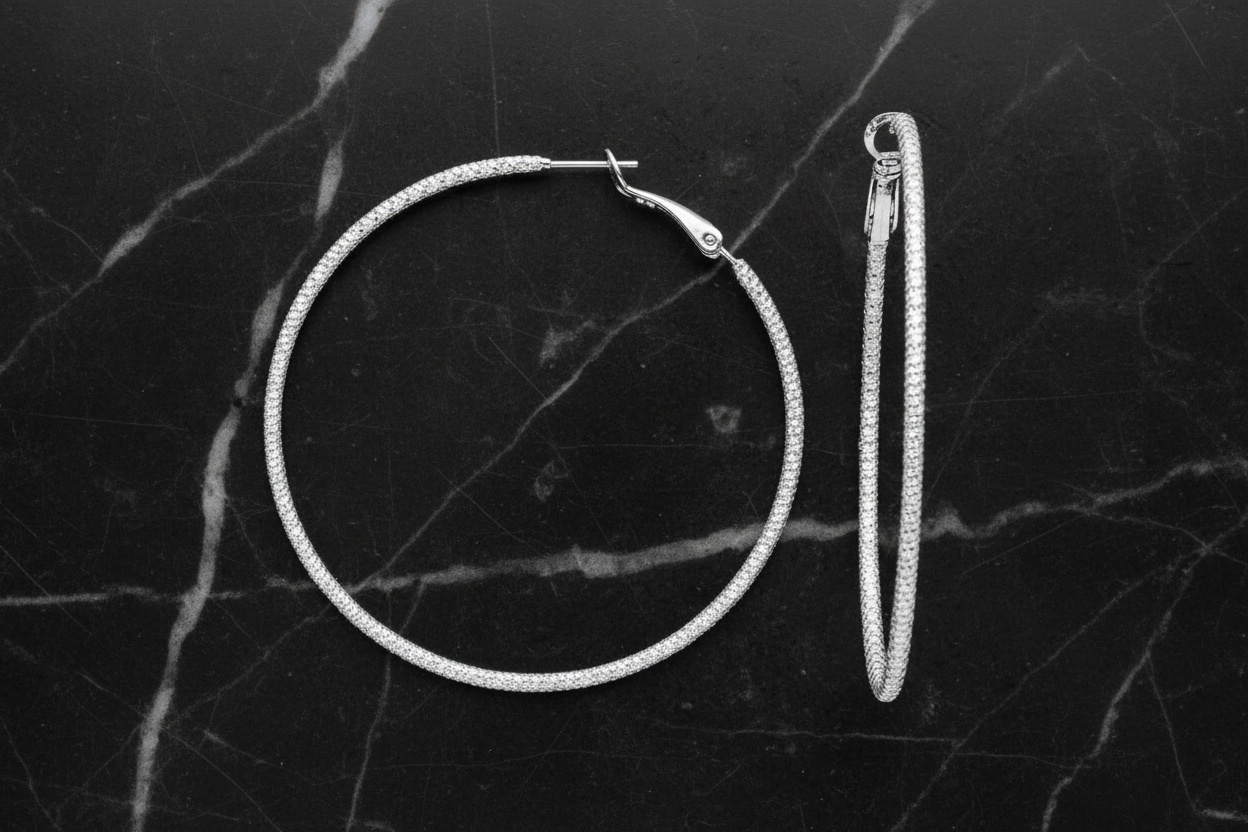 Silver 2.25-inch round cable hoop earring by Lorena, showcasing a sleek, minimalist design perfect for everyday wear.