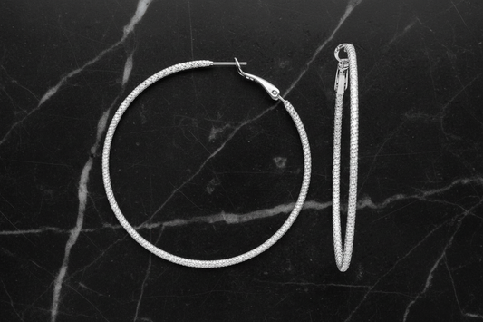 Silver 2.25-inch round cable hoop earring by Lorena, showcasing a sleek, minimalist design perfect for everyday wear.