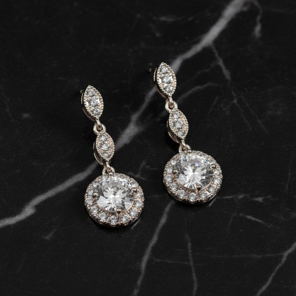 Lorena fancy silver dangle CZ earring with sparkling cubic zirconia stones and intricate design, perfect for elegant style.