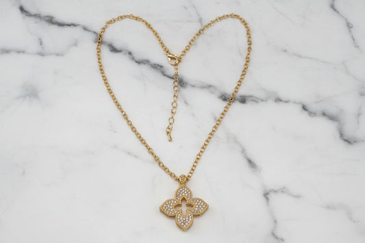 Gold Lorena necklace with a pave clover pendant, featuring intricate detailing and a delicate chain.