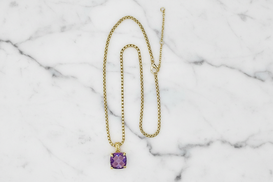 Lorena gold box chain necklace with a pendant, featuring a sleek, polished design and a delicate clasp for elegant wear.