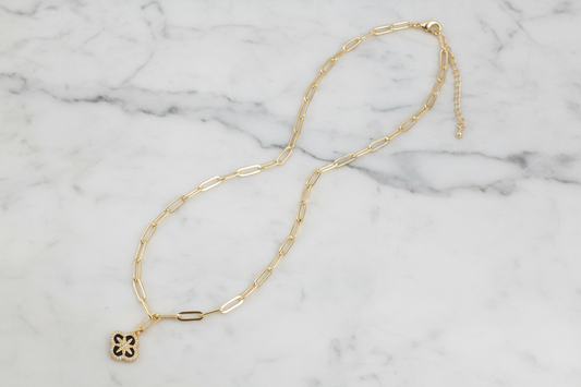 Lorena gold paper clip necklace with CZ clover pendant, stylish jewelry accessory featuring a modern design and sparkling detail.
