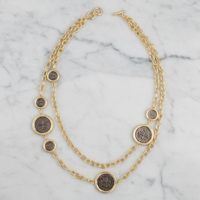 Lorena 2-strand gold chain necklace with hem coins, featuring a stylish layered design and intricate coin details.