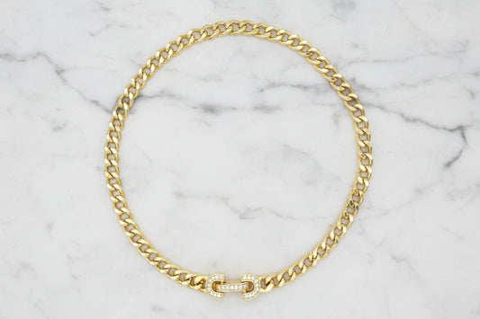 Lorena gold chain necklace with CZ clasp, showcasing a sleek, elegant jewelry piece with sparkling cubic zirconia accents.