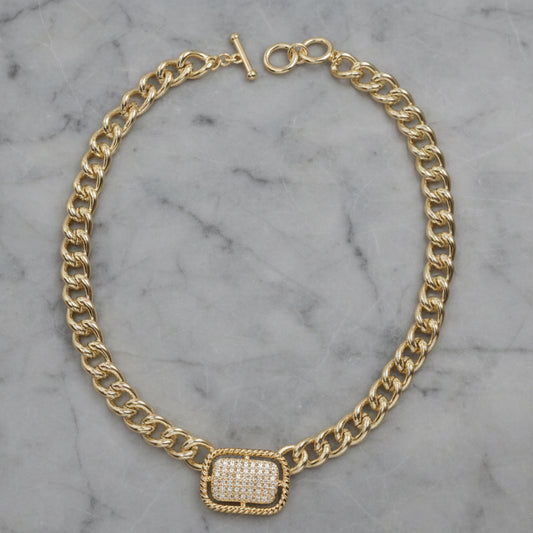 Lorena gold link chain necklace with pave insert, showcasing a stylish and elegant jewelry piece with intricate detailing.