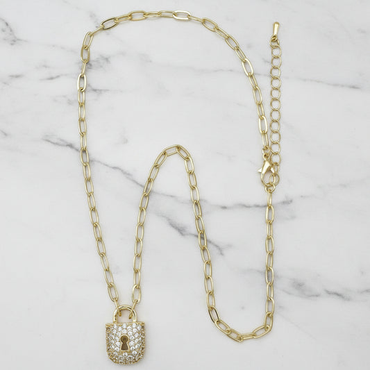 Lorena gold link chain necklace with pave lock, showcasing shiny interconnected links and decorative lock detail.