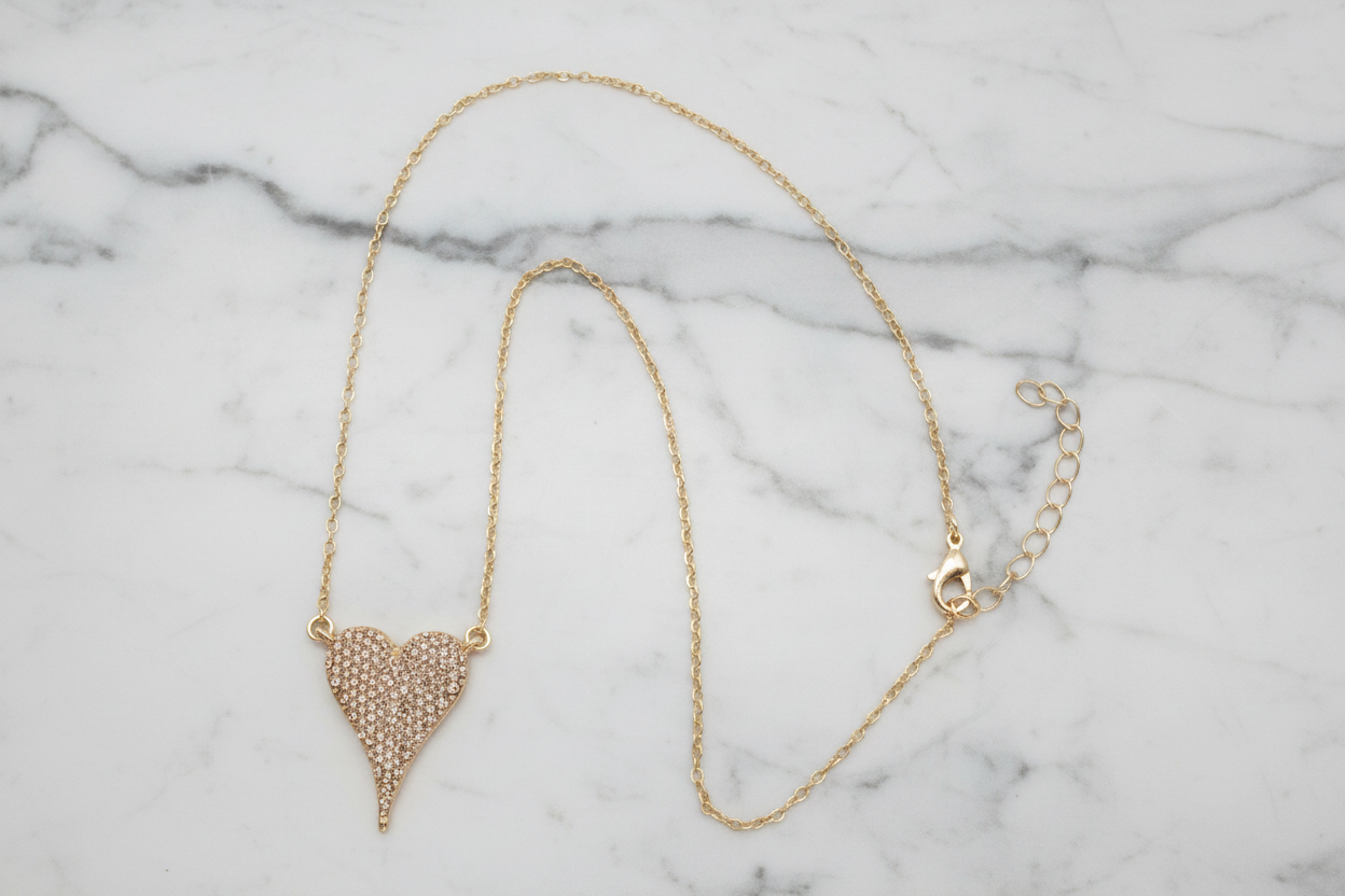 Lorena pave heart necklace with a 16-inch chain, featuring a sparkling heart pendant on a delicate jewelry necklace.