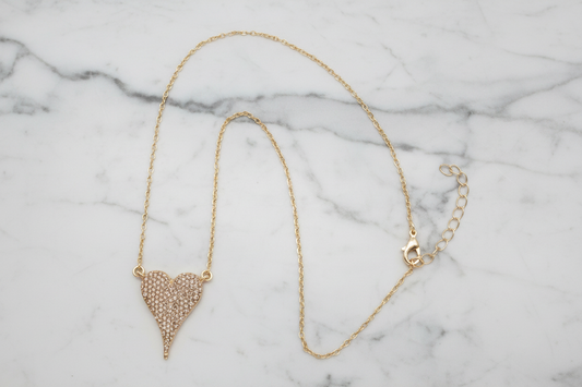 Lorena pave heart necklace with a 16-inch chain, featuring a sparkling heart pendant on a delicate jewelry necklace.