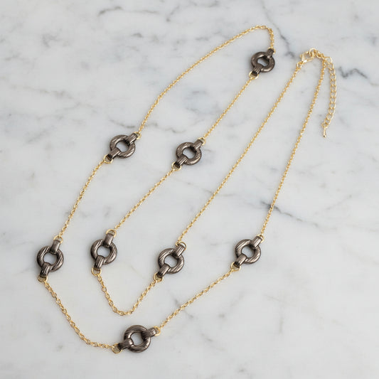 Lorena matte gold necklace with linked chain, 36-inch length, stylish jewelry accessory for women.