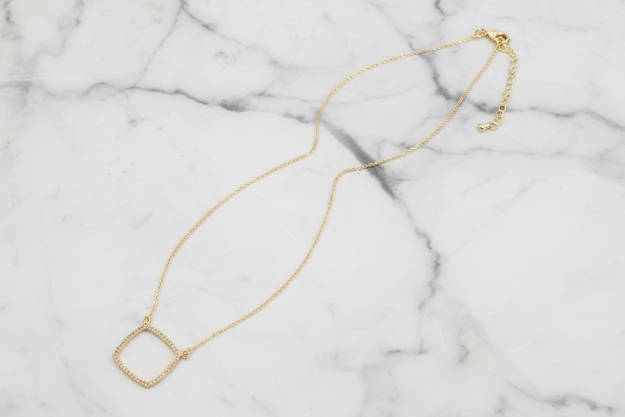Lorena pave 1/2-inch open square necklace, 16-inch chain, featuring a modern geometric design with sparkling pave detailing.
